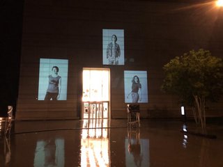 Portrait of Dr. Miriam Benteler, along with two other portraits from Larissa Barth’s walter ≠ bauhaus series, projected onto the façade of the Bauhaus Museum Weimar.