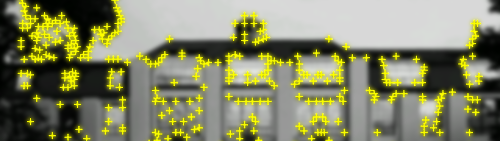 Image target with yellow crosses of the image of the bauhaus main building. It displays a contrast based features of the image that are visible to camera.